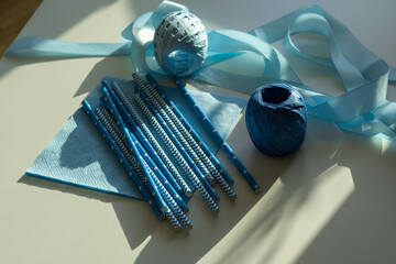 Decor for gender reveal party, birth child baby shower concept baby boy only top view. Copy space