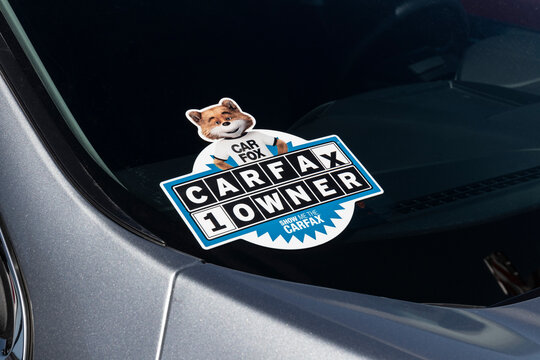 Carfax sticker on a used pre-owned vehicle. Carfax provide vehicle reports for prospective buyers that may reveal problems.