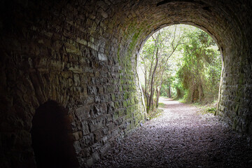 An old stone tunnel on a footpath in the Basque Coast Geopark, between Zumaia and Deba, Spain