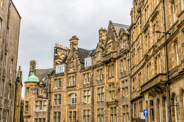 Fototapeta na wymiar A view of typical Victorian architecture in an Edinburgh street, Scotland on a summers day