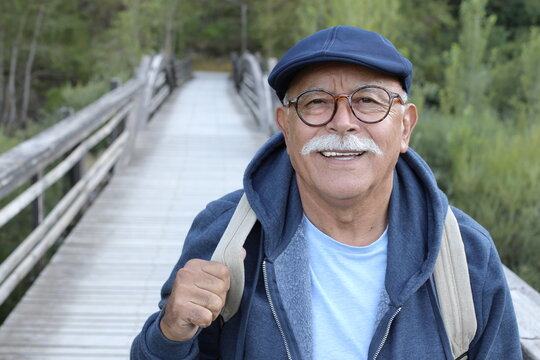 Ethnic Senior Man Walking Outdoors