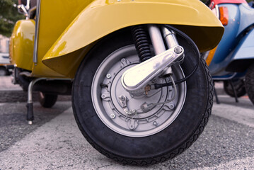 Fototapeta na wymiar close up of the tire of a vintage italian scooter, symbol of Italian design