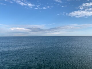 Perfect seascape horizon, natural sea view background, blue sky, surface of the water