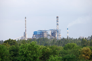 Oil refinery factory,Factory building,Pipe factory smoke,Oil refinery factory at sky.