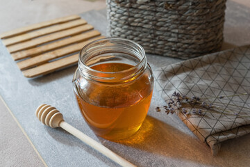 Top view of the composition on the table of their lavender honey, tea and lavender flowers