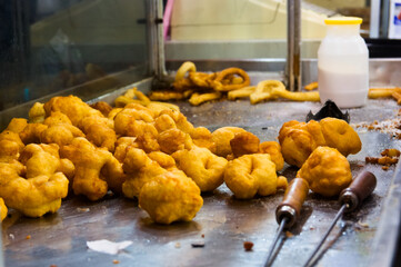 Buñuelos in a street stall in the Fallas of Valencia, Spain