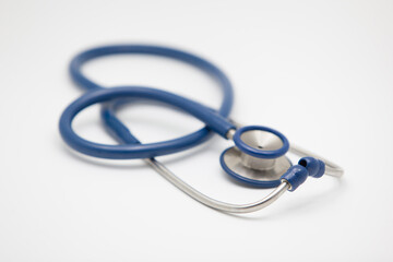 Medical headphones placed on a white background.
