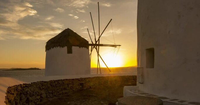 Timelapse of the iconic windmills at sunset in Mykonos, Greece
