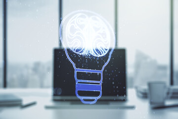 Creative idea concept with light bulb and human brain illustration on modern laptop background. Neural networks and machine learning concept. Multiexposure