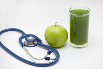 Apple on white background,stethoscope and apple.
