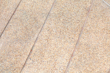 Ramp way for support wheelchair disabled people made from sand and small gravel stone washed floor.