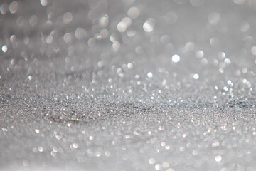 silver and white bokeh lights defocused. abstract background