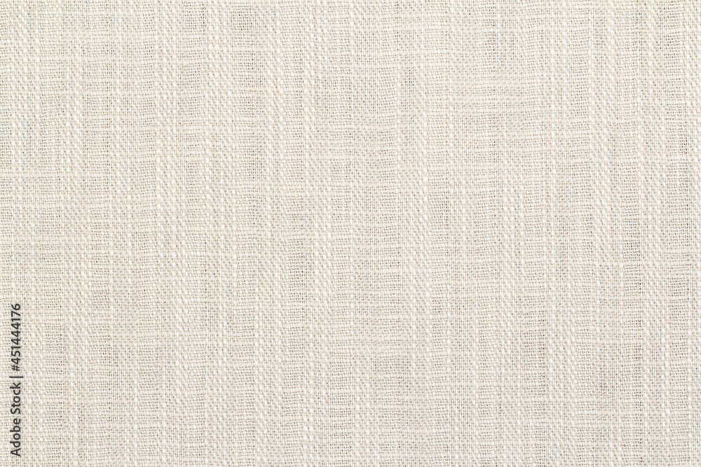 Wall mural texture of linen fabric as a background or backdrop, beautiful weaving of threads, copy space.