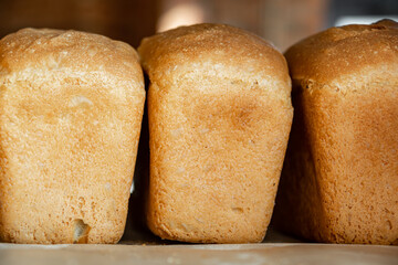 Photo of baked bread. A loaf of bread. Private bakery.