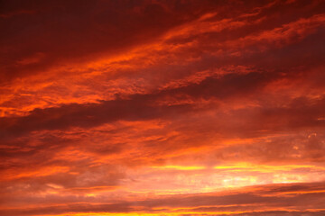 Red sunset sky with dramatic clouds