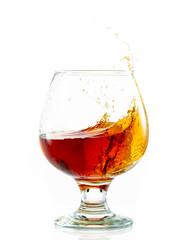 splash and flow in a round brandy glass