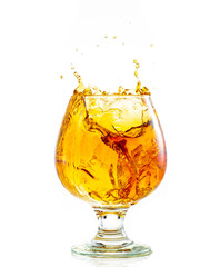splash and flow in a round brandy glass