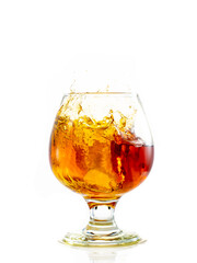splash and flow in a round brandy glass