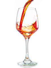 splash of red wine in glass on white background