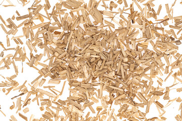 Oak chips sawdust isolated white background. small wood chips for smoking. sawdust texture . ecological fuel