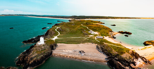 Aerial view of Twr Mawr lighthouse meaning great tower in Welsh on Ynys Llanddwyn on Anglesey Wales...