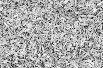 Oak chips sawdust texture. small wood chips for smoking. sawdust background. ecological fuel