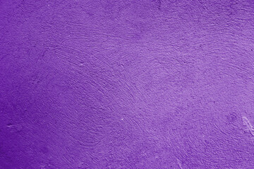 Closeup of purple textured grunge background. Purple wall