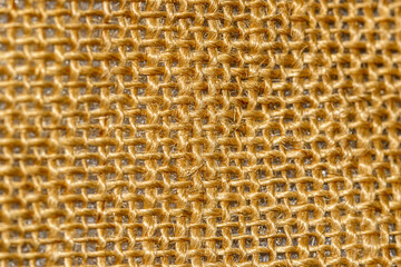 Yellow wicker background for design. Coarse rope weaving. Burlap background