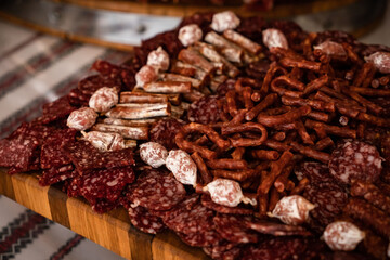 Wedding sweets, decorated tables, decorations and cupcakes, delicious meat and delicacies