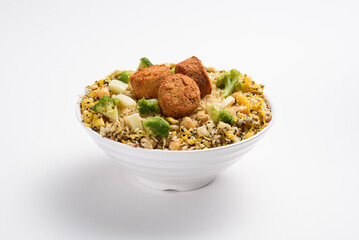 Healthy bowl of multigrain rice with falafel, broccoli and chickpeas, isolated