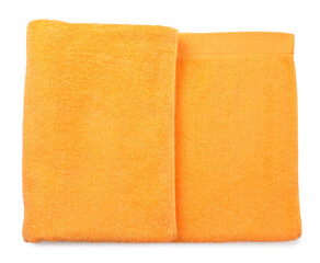 Folded orange beach towel isolated on white, top view