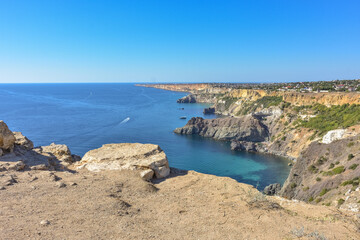 Cape Fiolent. Beautiful views of the Black Sea coast at Cape Fiolent in summer in clear weather. Aerial view to beautiful sea coast with turquoise water and rocks