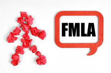 On a white background, a red paper man and a sign with the inscription - FMLA