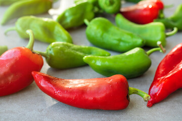 Colorful peppers on gray table
