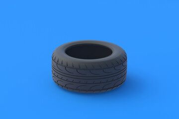 Car tyre on blue background. Automotive parts. Traffic safety. Automobile service. Buying, selling of tires. 3d render