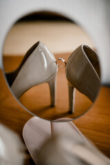 engagement ring and shoes