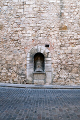 Naklejka premium Passageway in the old town of Pals in Girona, Catalonia.