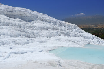Natural travertine pools and terraces in Pamukkale. Cotton castle in southwestern Turkey