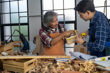 carpenter person trainer professional teaching and training to craftman for work with wood and industrial tools, woodwork business worker craft workshop concept, student and teacher trainer