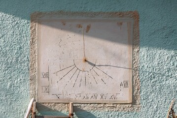Ancient wall solar sun sundial clock time hour dial - obrazy, fototapety, plakaty