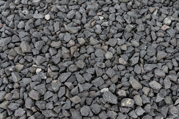 Black Stones ground path way sidewalk pavement cover gravel material