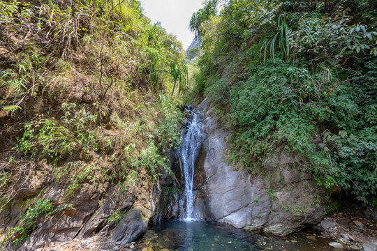 A waterfall on the Annapurna hiking trek in the Himalaya in Nepal