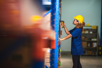 African American woman are work with business distribution inventory in warehouse factory, female...