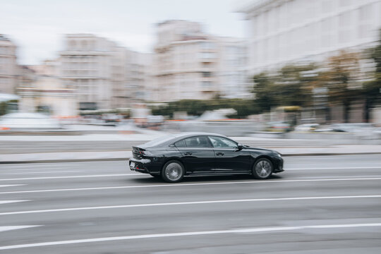 Ukraine, Kyiv - 2 June 2021: Black Peugeot 508 car moving on the street. Editorial