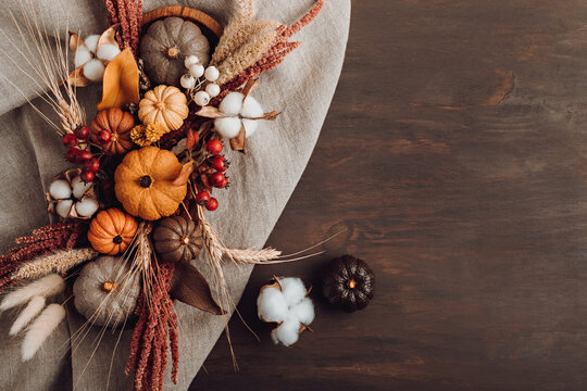 Rustic mockup with autumn table decoration. Floral interior decor for fall holidays