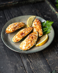 mussels cream sauce baked cheese seafood meal snack on the table copy space food background rustic top view