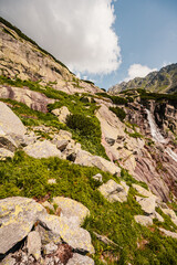 Mountain valley with waterfall Skok. High Tatras national park , Mlynicka dolina, Slovakia landscape. © Zedspider