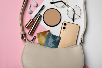 Flat lay composition with stylish woman's bag on color background
