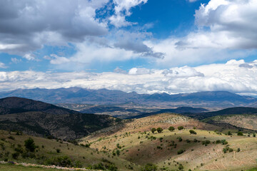 Fototapeta na wymiar Spectacular view of the wonderful grass mountains within the borders of Kelkit, Gumushane