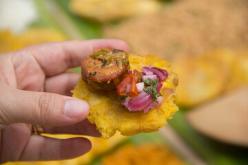 Ecuadorian food: Longaniza, patacón and salad